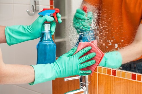Cleaner Queenspark staff applying safe cleaning procedures
